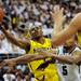 Michigan freshman Glenn Robinson III reaches for a basket around Michigan junior Adreian Payne during the second half at Breslin Center in East Lansing on Tuesday, Feb. 12. Melanie Maxwell I AnnArbor.com